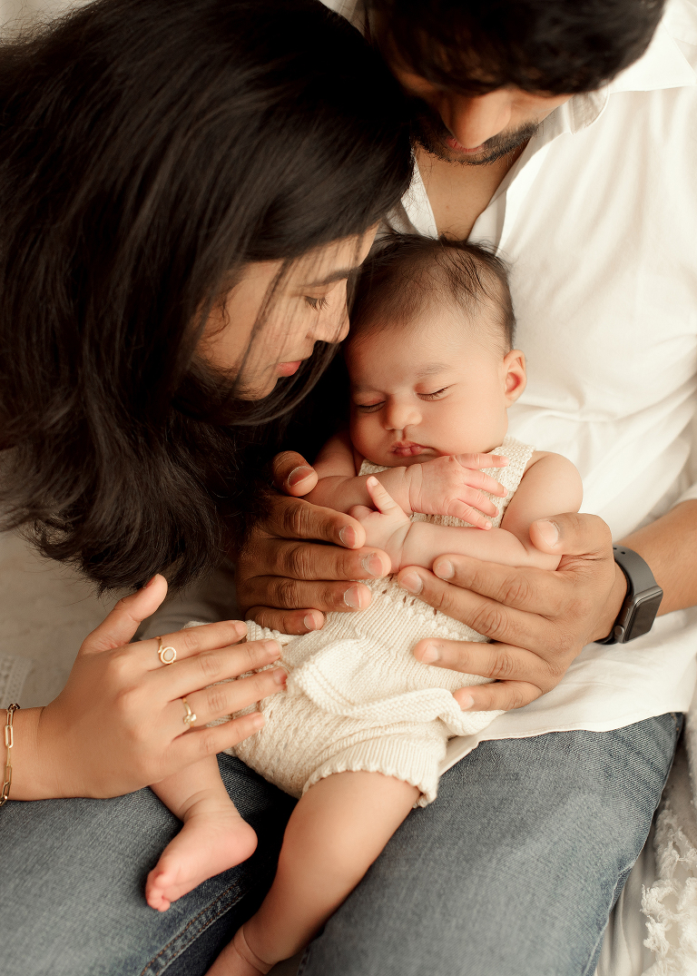 Close up of mom and dad in newborn photography