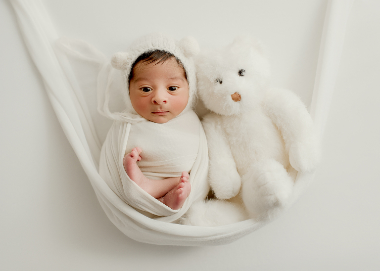 newborn baby boy with teddy 