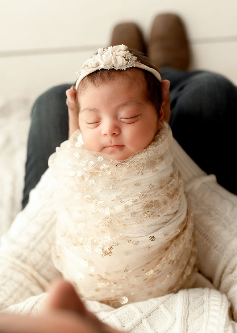 Frisco TX newborn photographer capturing baby girl newborn session