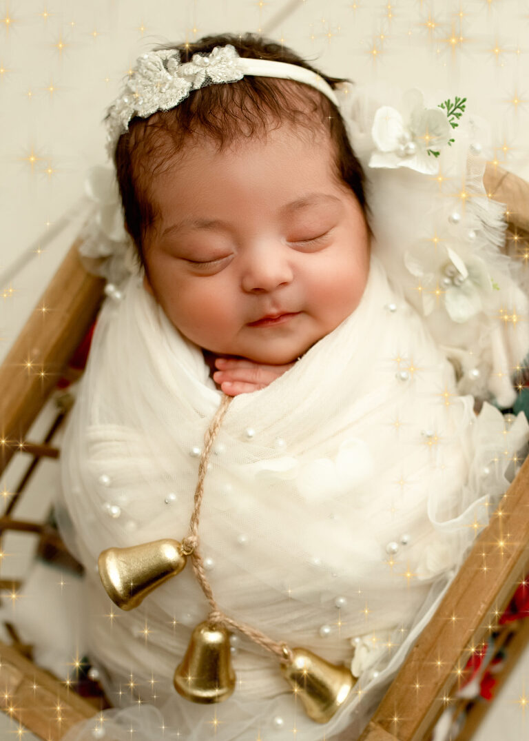 Frisco TX newborn photographer capturing baby girl newborn session