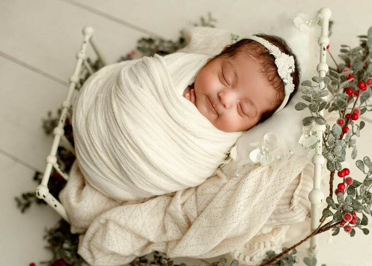 Frisco TX newborn photographer capturing baby girl newborn session