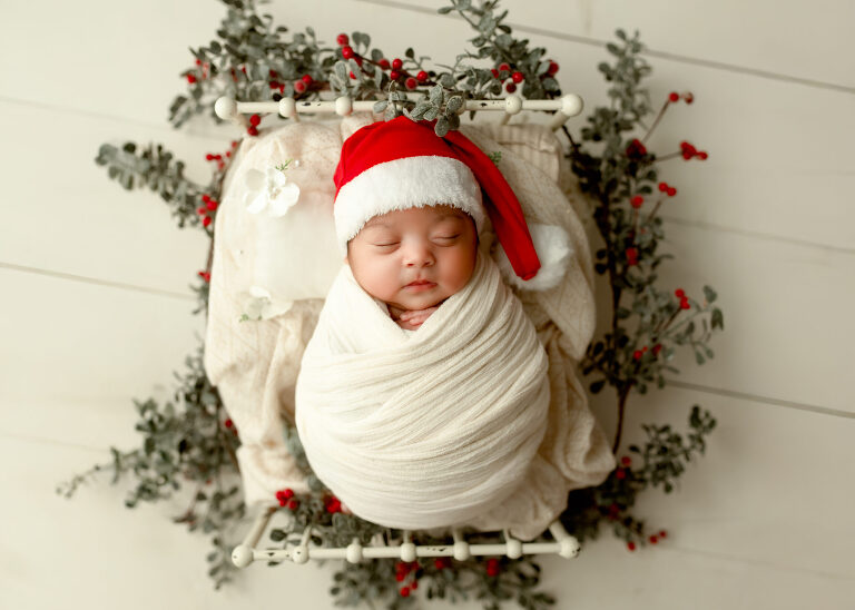 Frisco TX newborn photographer capturing baby girl newborn session