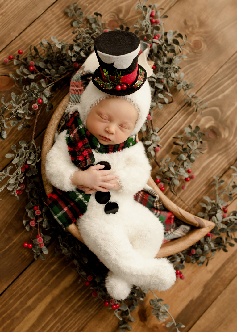 Frisco TX newborn photographer capturing Christmas newborn baby boy session