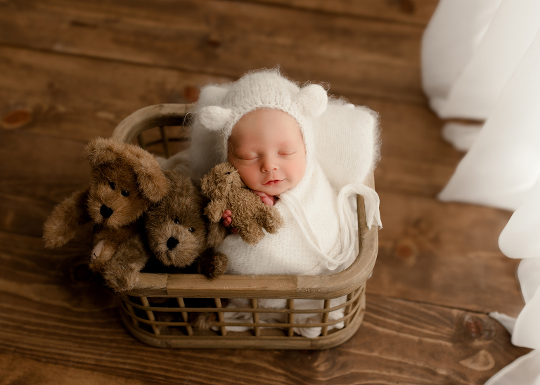 Frisco TX newborn photographer capturing Christmas newborn baby boy session