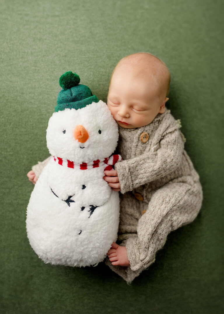 Frisco TX newborn photographer capturing Christmas newborn baby boy session