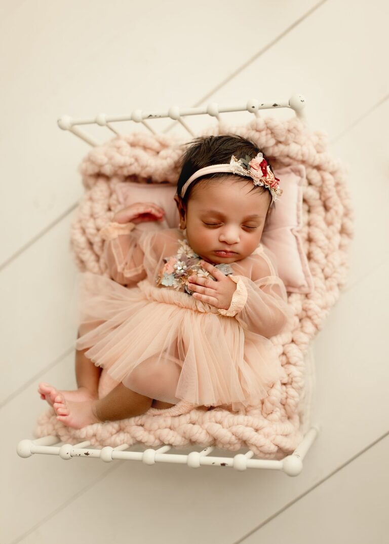 DFW newborn photographer capturing newborn baby girl session