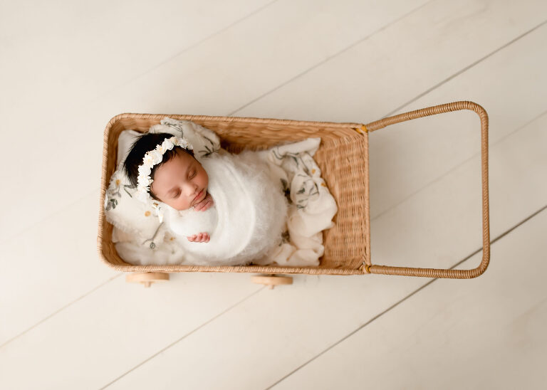 DFW newborn photographer capturing newborn baby girl session