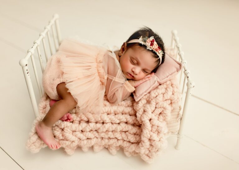 DFW newborn photographer capturing newborn baby girl session