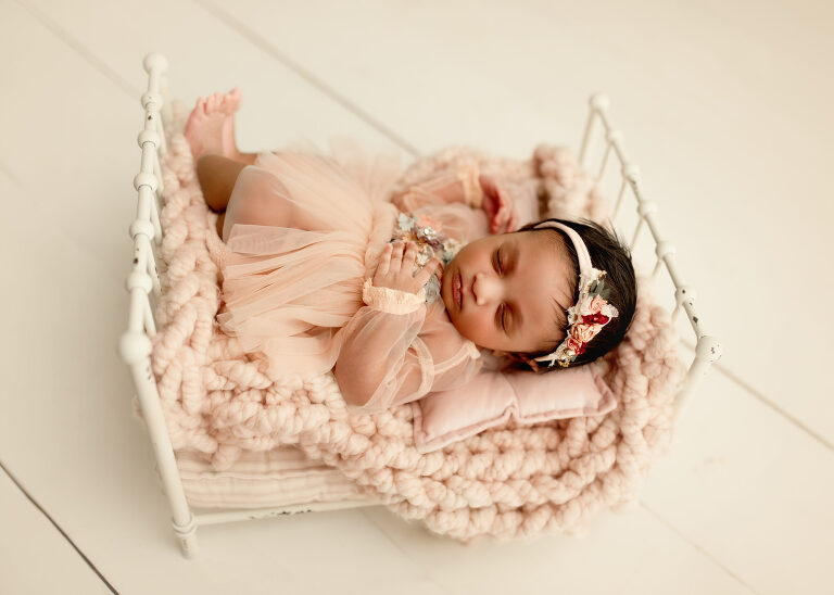 DFW newborn photographer capturing newborn baby girl session