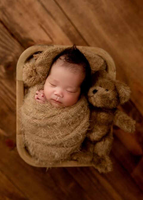Prosper TX newborn photographer capturing newborn baby boy session